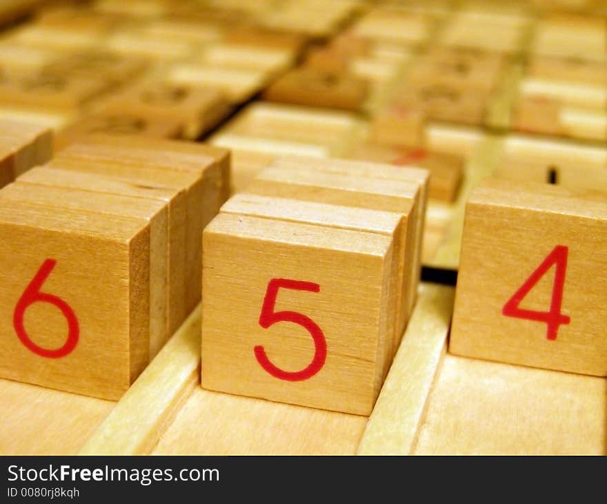 Wood sudoku board and tiles.