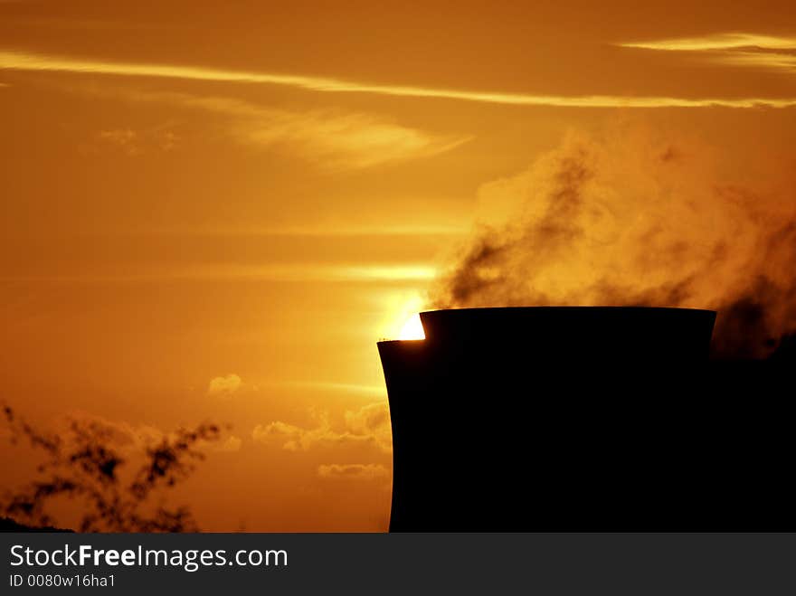 The sun going down behind the cooling towers of the Ironbridge Powerstation, Telford, England. The sun going down behind the cooling towers of the Ironbridge Powerstation, Telford, England.