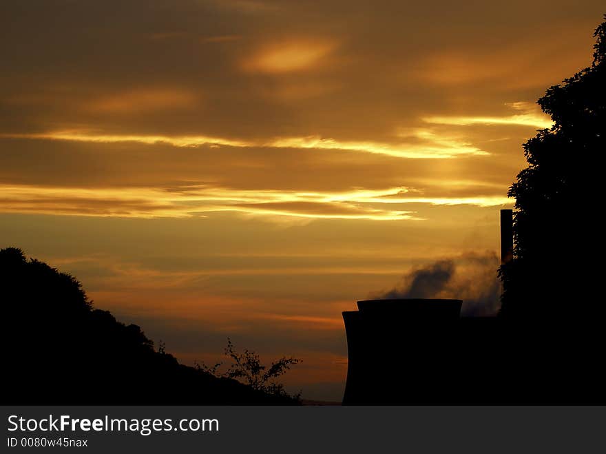 The sun going down behind the cooling towers of the Ironbridge Powerstation, Telford, England. The sun going down behind the cooling towers of the Ironbridge Powerstation, Telford, England.