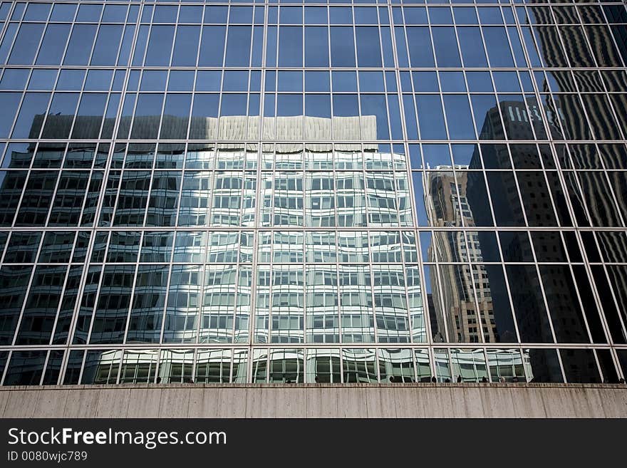 Reflection of an office building in another office building. Reflection of an office building in another office building