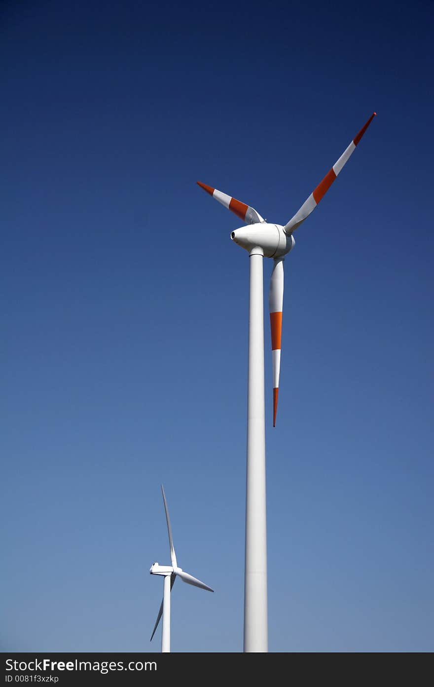 White solar energy station with cloudless sky in background. White solar energy station with cloudless sky in background