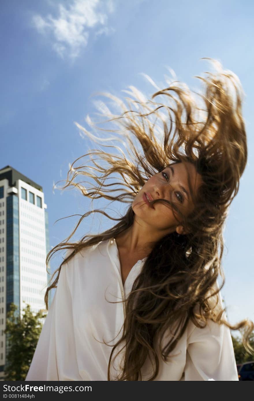 young businesswoman in front of a building. young businesswoman in front of a building