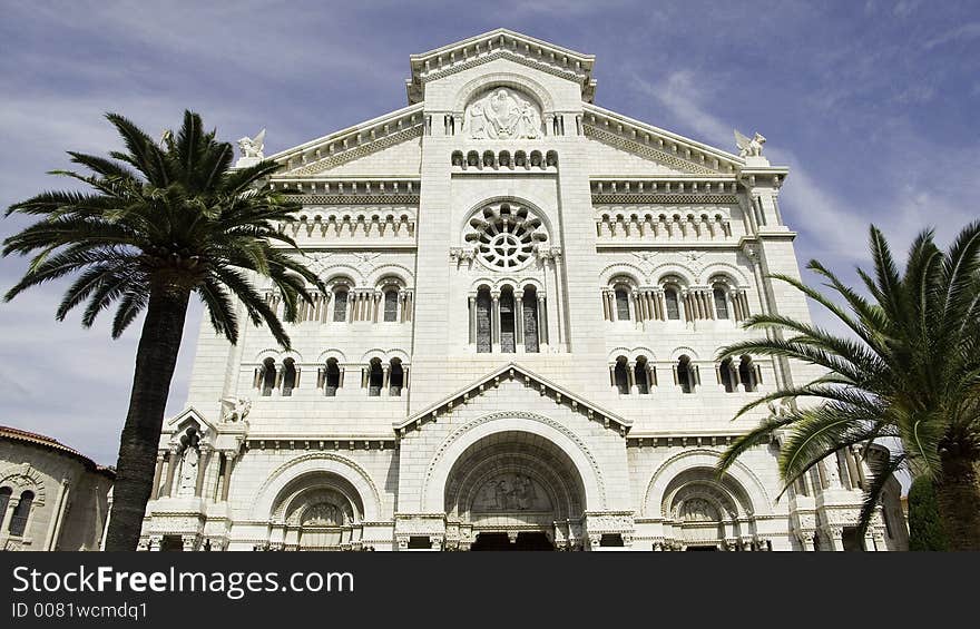 Classic cathedral in monaco with two palm trees. Classic cathedral in monaco with two palm trees