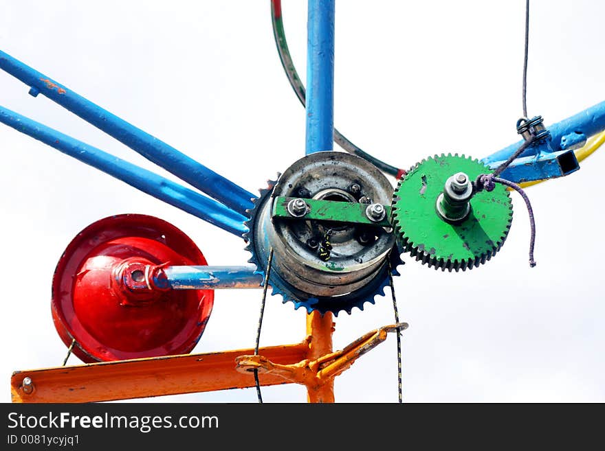 Colorful wheels in iron. This is a team work. Colorful wheels in iron. This is a team work