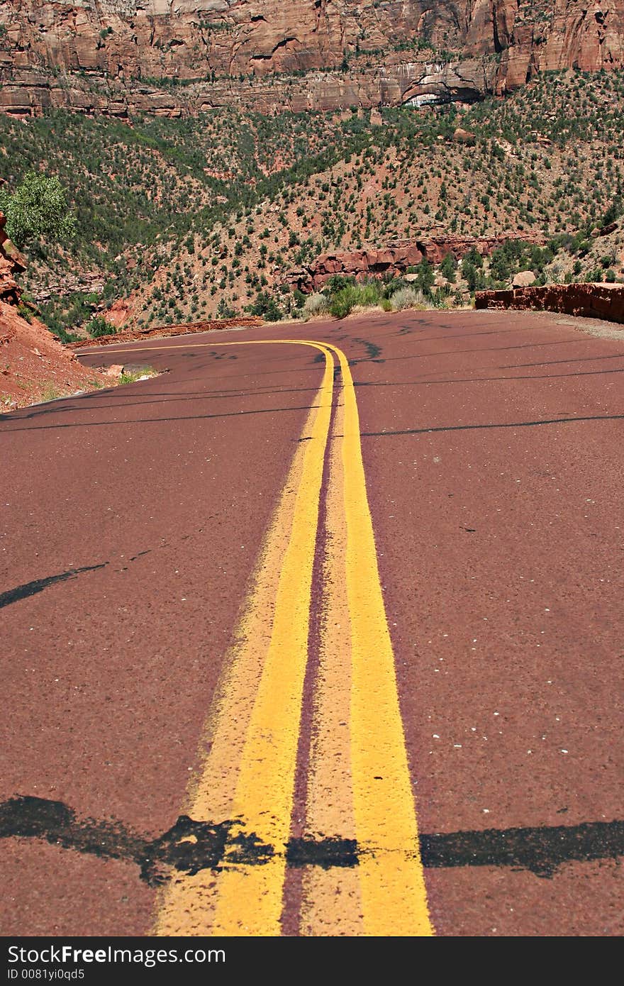 Curvy red road to the mountains. Curvy red road to the mountains