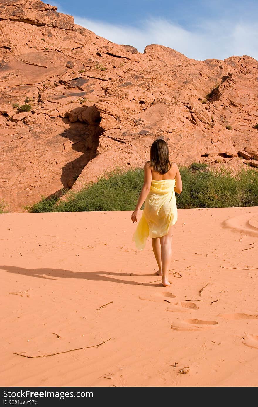 Girl Walking On Sand Dunes