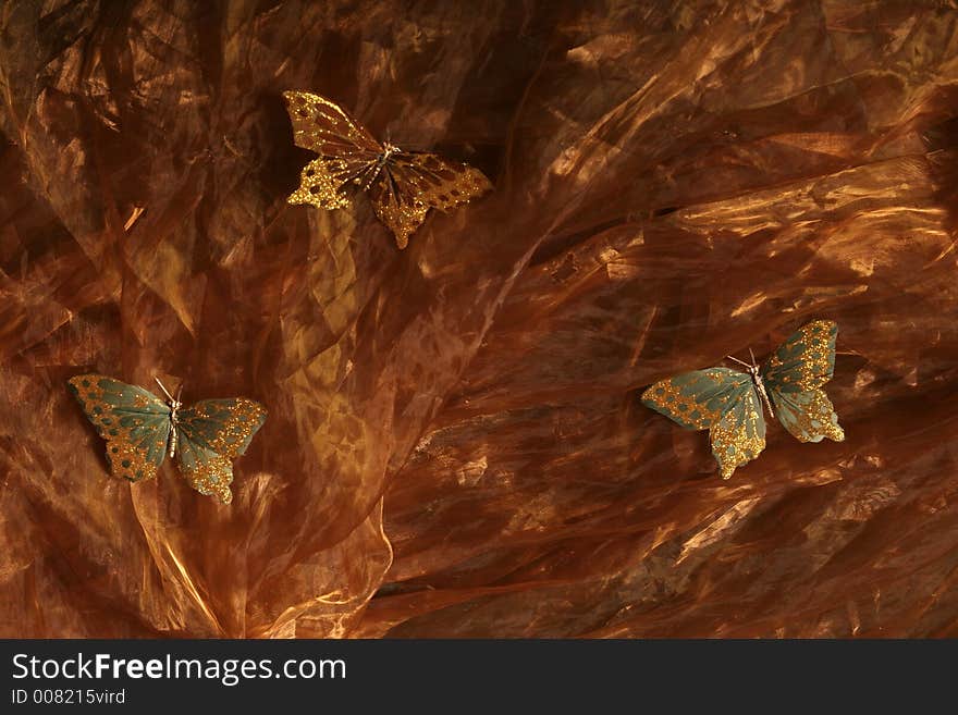 Butterflies on silky textile