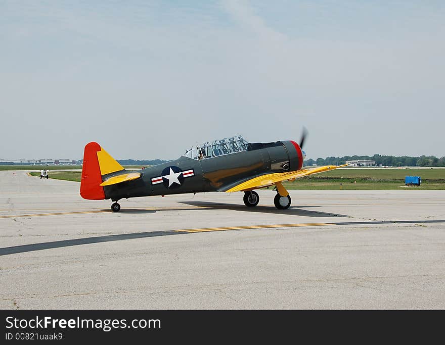 World War II T-6 pilot training aircraft performing at airshow. World War II T-6 pilot training aircraft performing at airshow