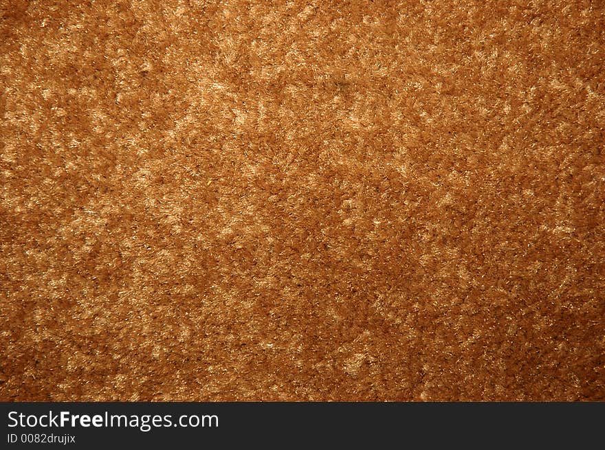 Close-up of brown material background. Close-up of brown material background