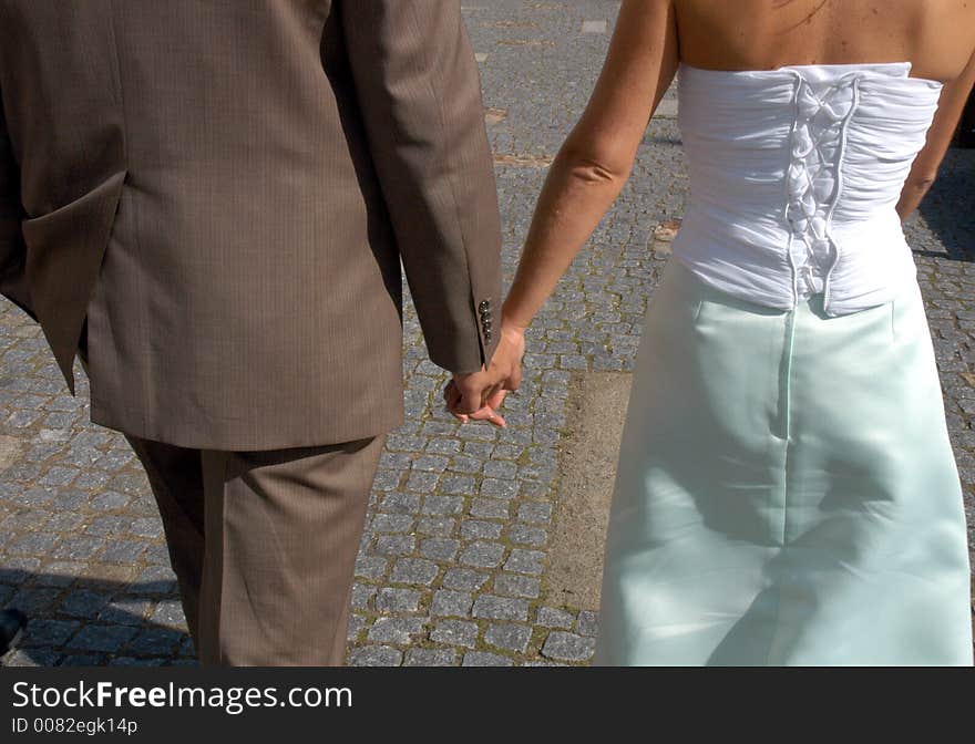 Wedding couple holding their hands. Wedding couple holding their hands