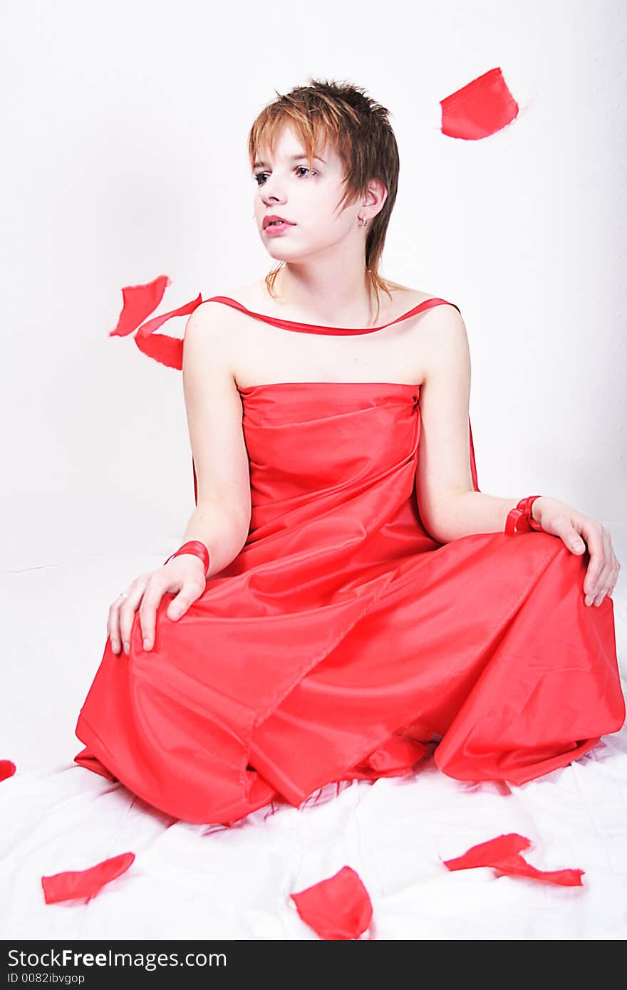 Attractive young tradition girl in red dress. Attractive young tradition girl in red dress.