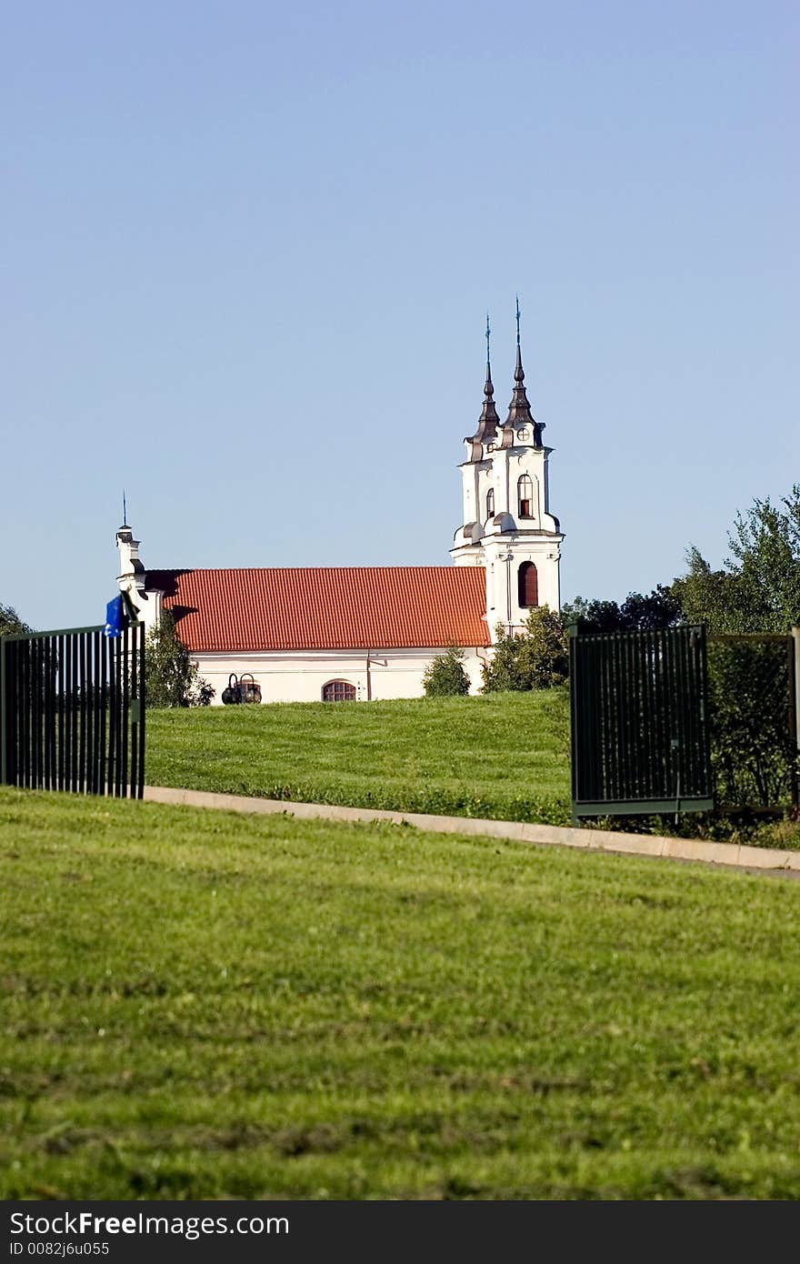 Church scene framed with entry gate. Church scene framed with entry gate