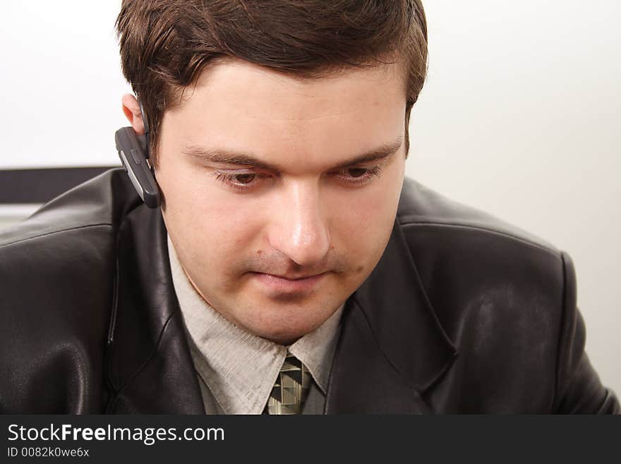 Portrait of a businessman in a working process. Portrait of a businessman in a working process