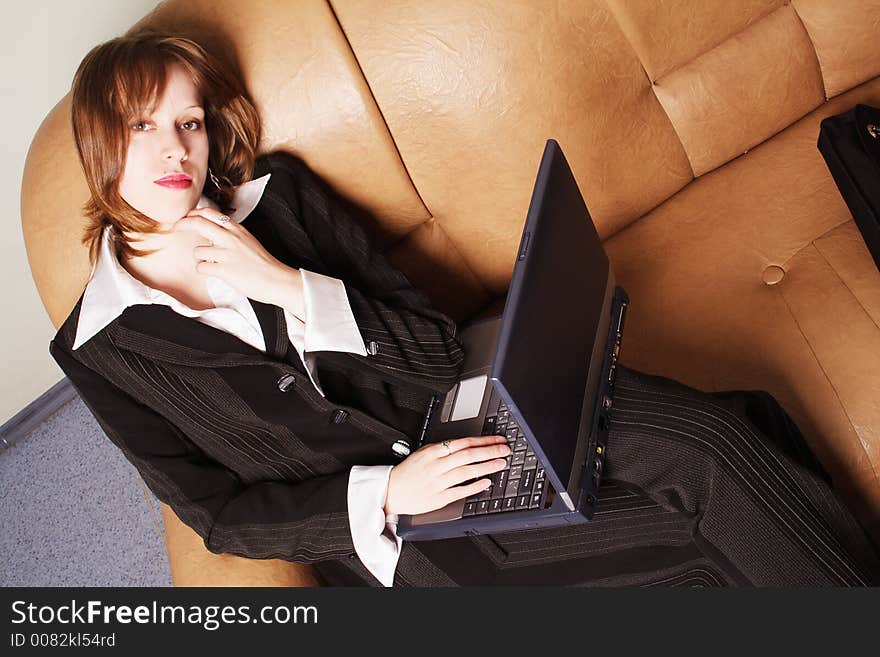 Portrait of a businesswoman when working. Shot in studio. Portrait of a businesswoman when working. Shot in studio.