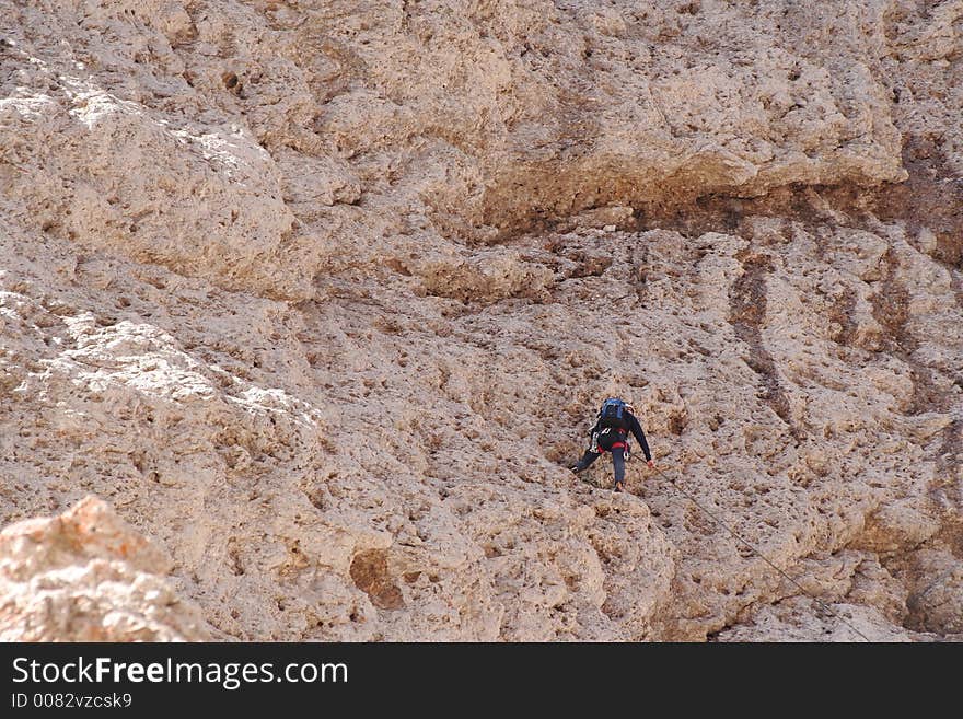 Rock climber on cliff,Dolomites,Italy