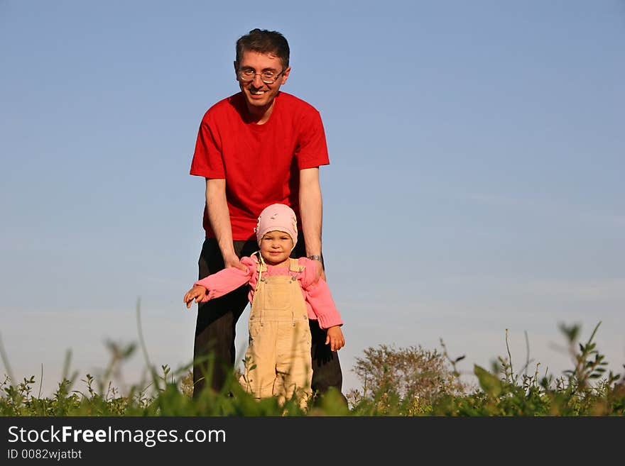 Father with baby on sky