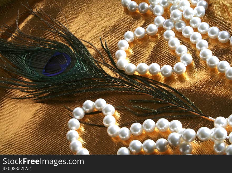 Pearls a necklace on a silk fabric