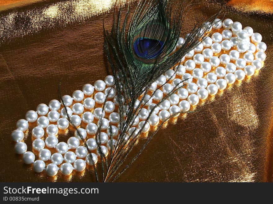 Pearls a necklace on a silk fabric