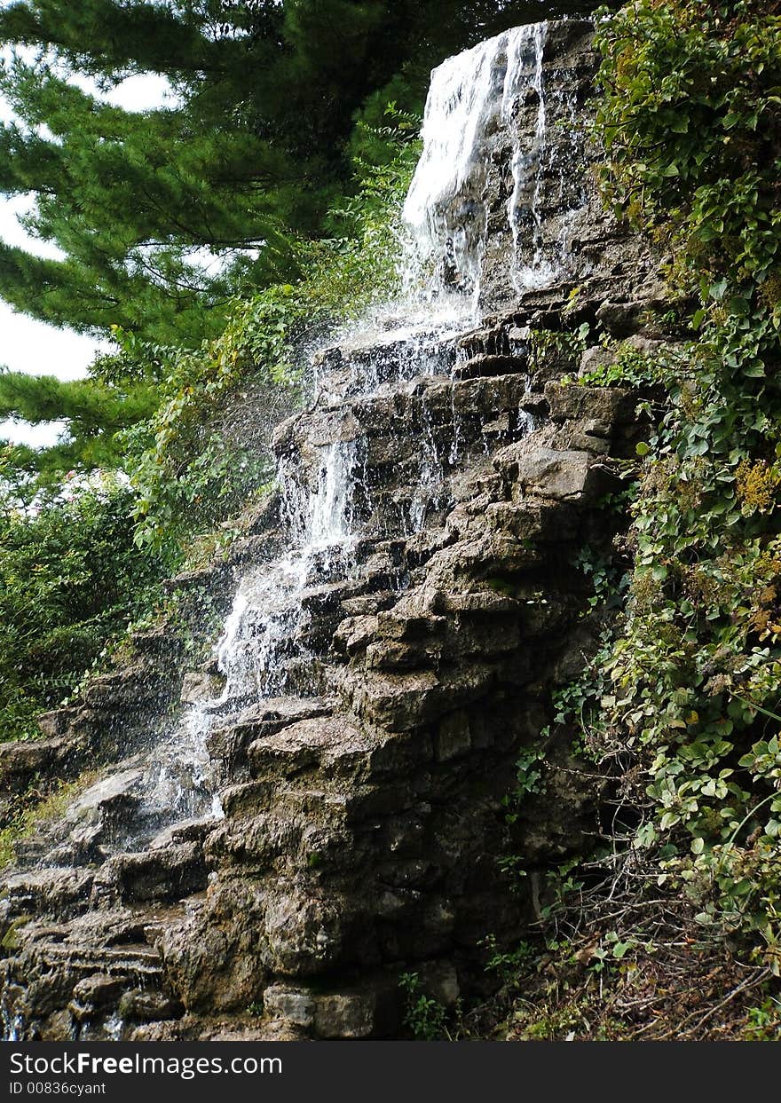 Waterfall, water cascading down slabs of rocks. Waterfall, water cascading down slabs of rocks