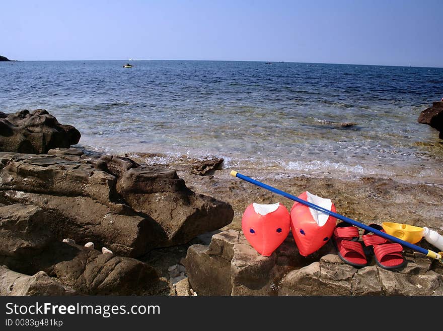 Colorful plastic toys on the beach. Colorful plastic toys on the beach.