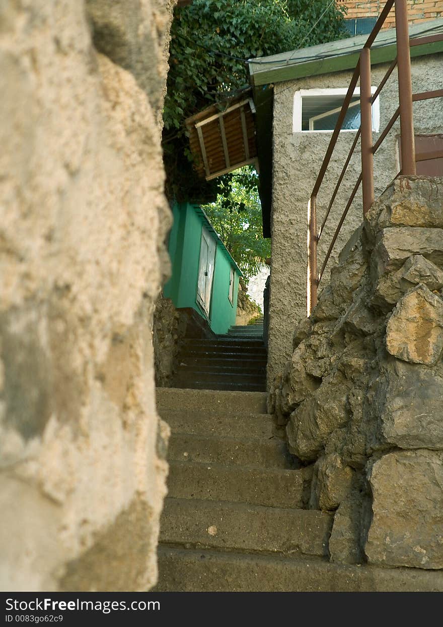 Tight alleyway and staircase in village. Tight alleyway and staircase in village