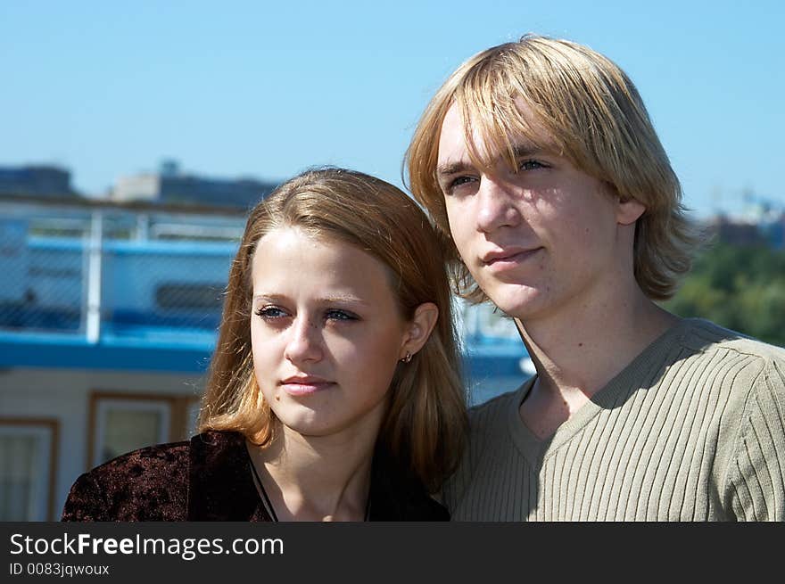 Young love couple in the park by Ob riverside, Novosibirsk. Young love couple in the park by Ob riverside, Novosibirsk