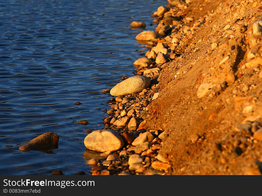 Stones by the lake bank