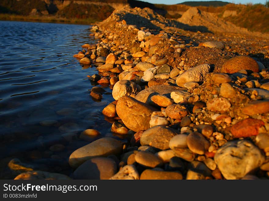 Stones by the lake bank