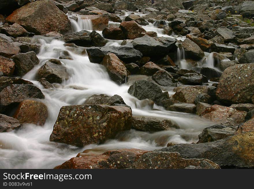 Rough mountain stream in northern mountains of the Europe. Rough mountain stream in northern mountains of the Europe