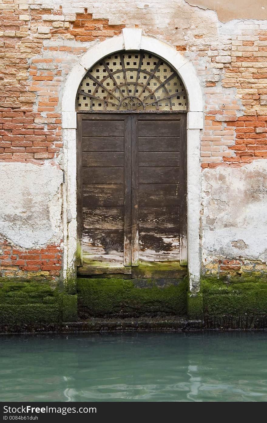 A view of a laguna-touched door in Venice, Italy. A view of a laguna-touched door in Venice, Italy