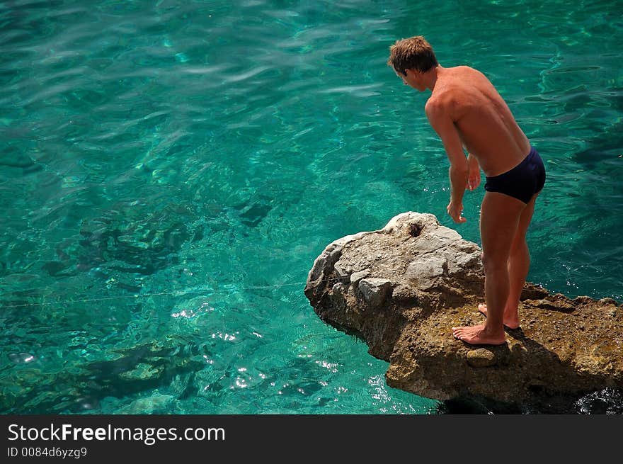 Pure sea water and a fisherman. Pure sea water and a fisherman