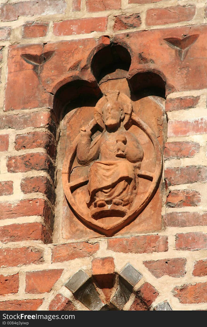 Terracotta sculpture on the church wall. Terracotta sculpture on the church wall