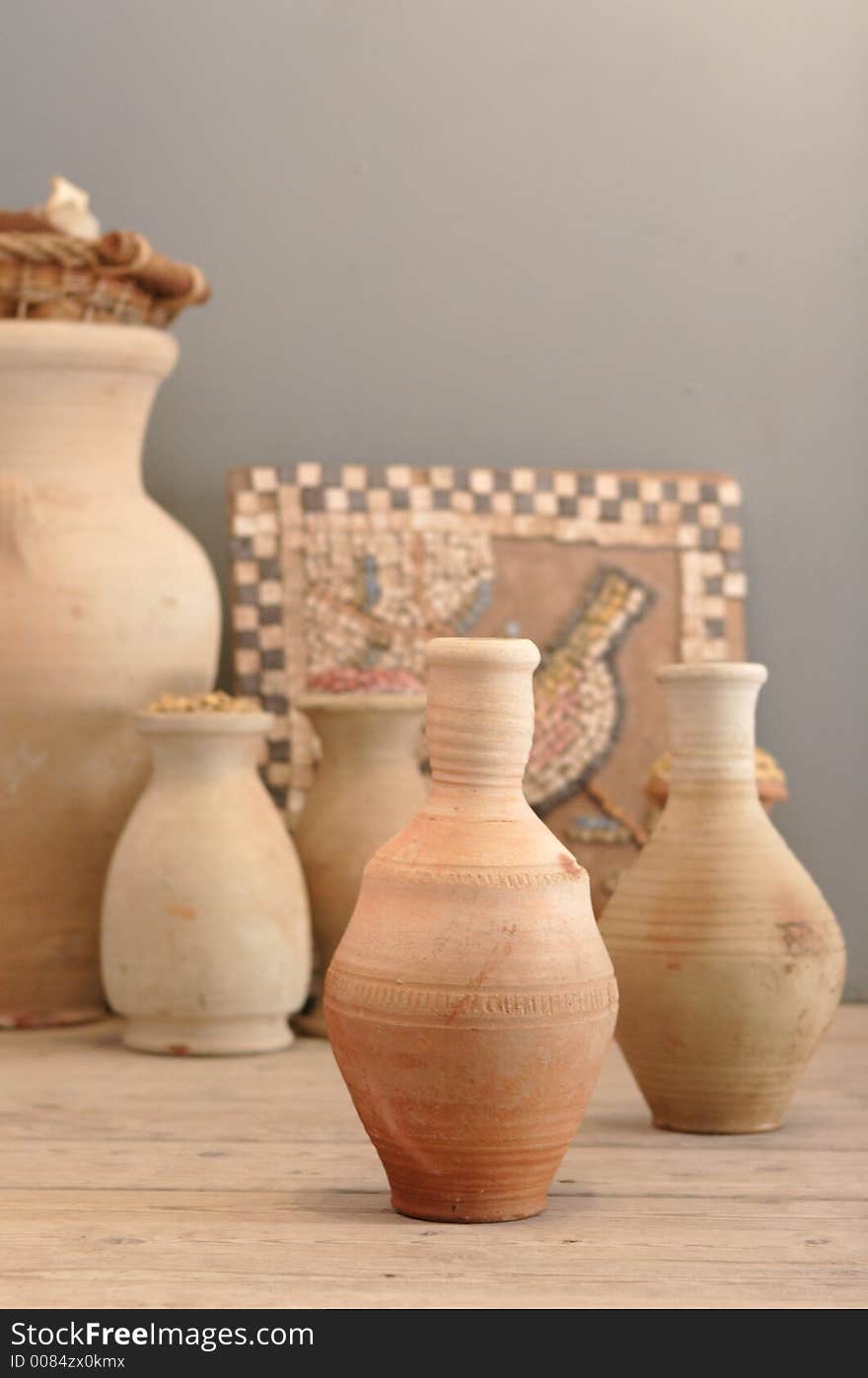 Ancient jugs and mozaic elements