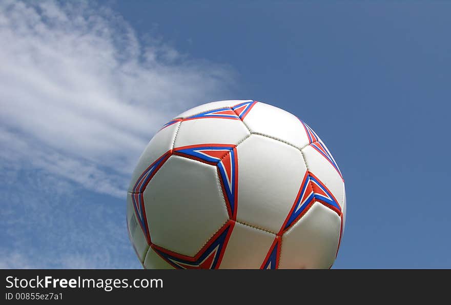 Soccer ball against blue sky. Soccer ball against blue sky