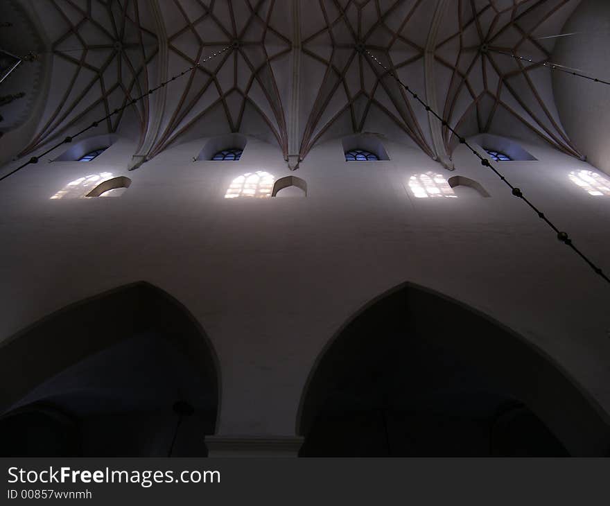 Old church ceiling with sunbeams