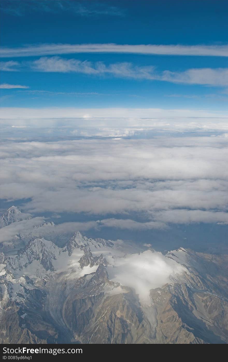 Glaciers in the European Alps seen from an airplane at 28.000 feet. Glaciers in the European Alps seen from an airplane at 28.000 feet.