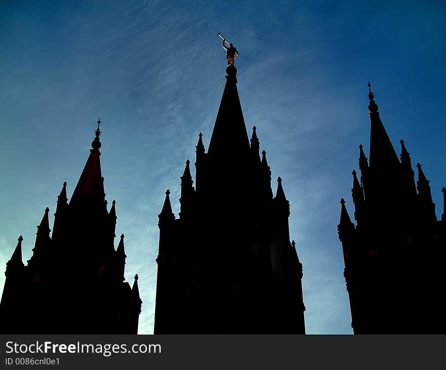 Mormon temple silhouette with blue sky