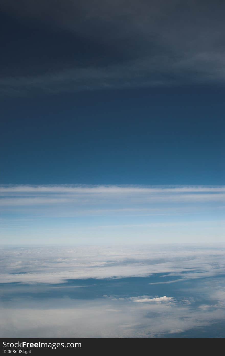 Weather above the continent seen from an airplane at 33.000 feet. Weather above the continent seen from an airplane at 33.000 feet.