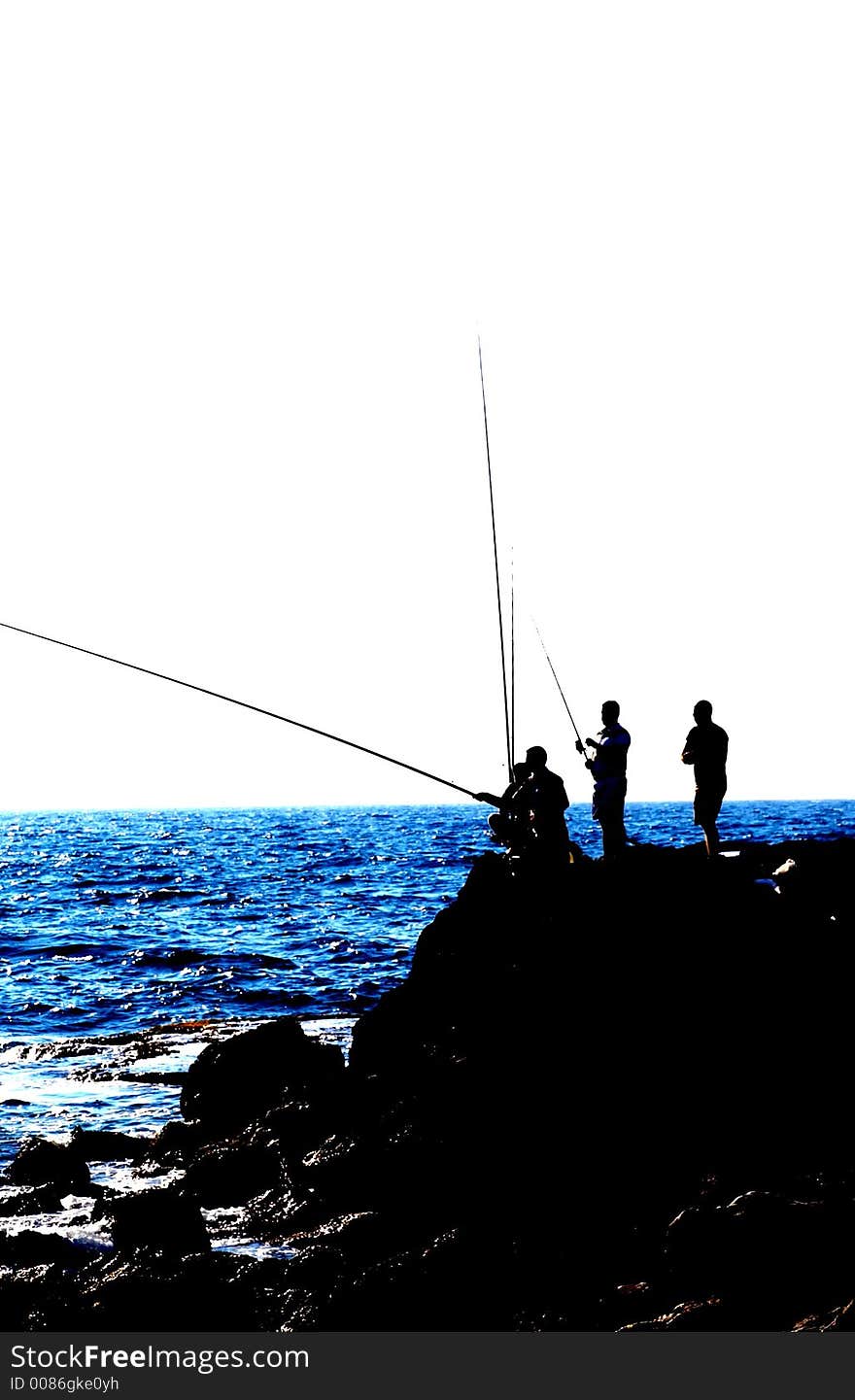 Fishers silhouette in Keisaria antique port , israel