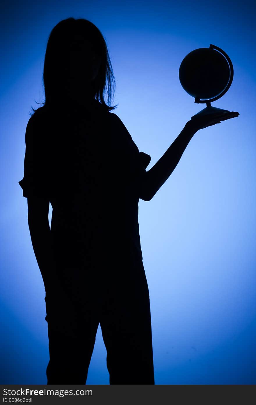 Isolated on blue silhouette of woman with globe