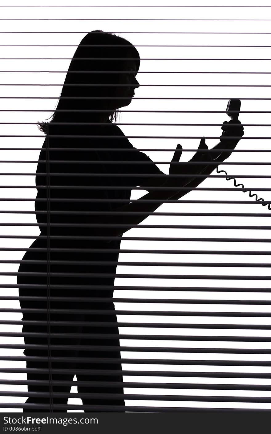 Silhouette of woman on the phone (blind)