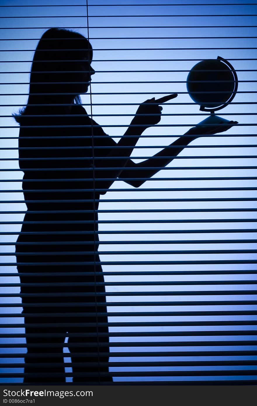 Silhouette of woman with globe (blind)