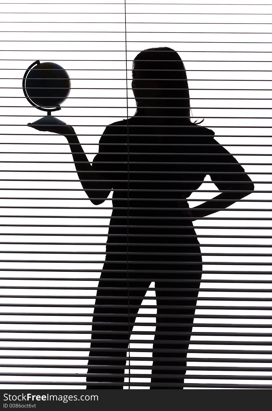 Silhouette of woman with globe (blind)