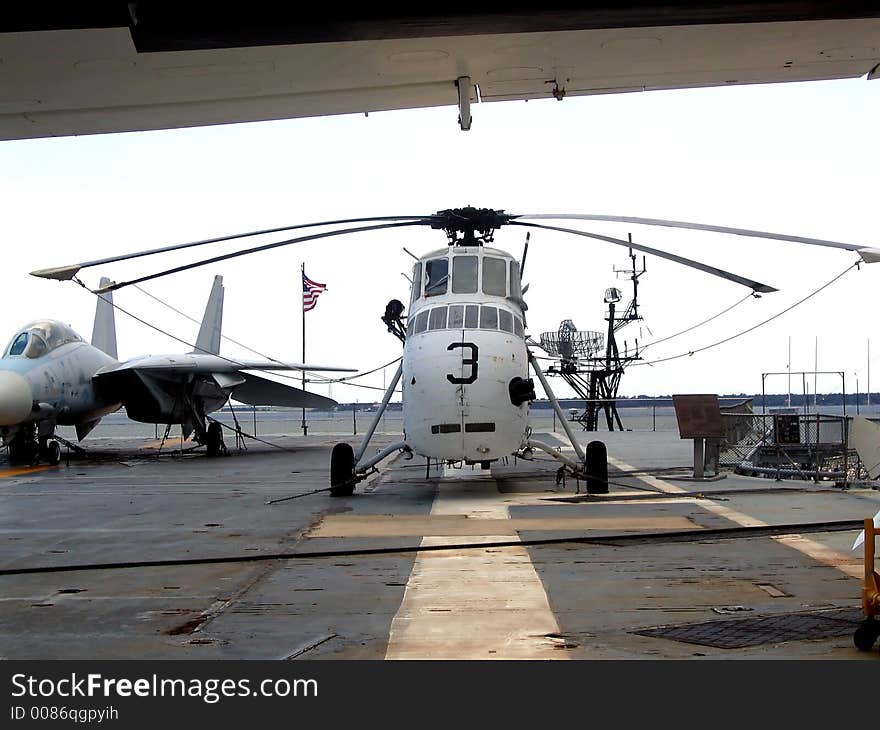 Military plane aboard a naval aircraft carrier