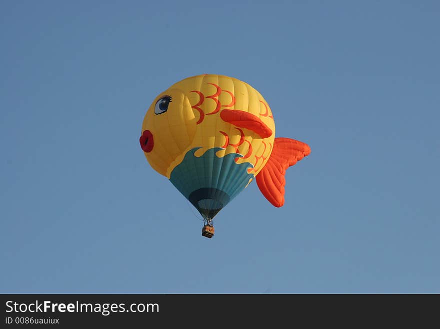 Hot air balloon, sky blue, fish. Hot air balloon, sky blue, fish