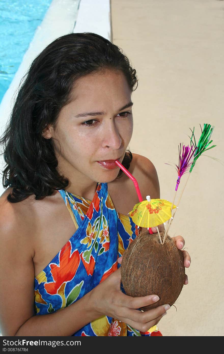 Girl drinking from a coconut. Girl drinking from a coconut