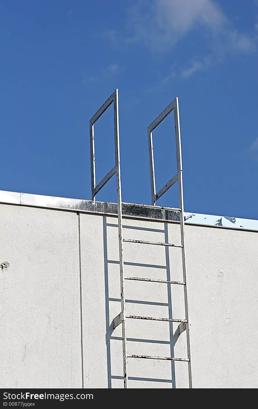 Industrial ladder to roof on back of restaurant