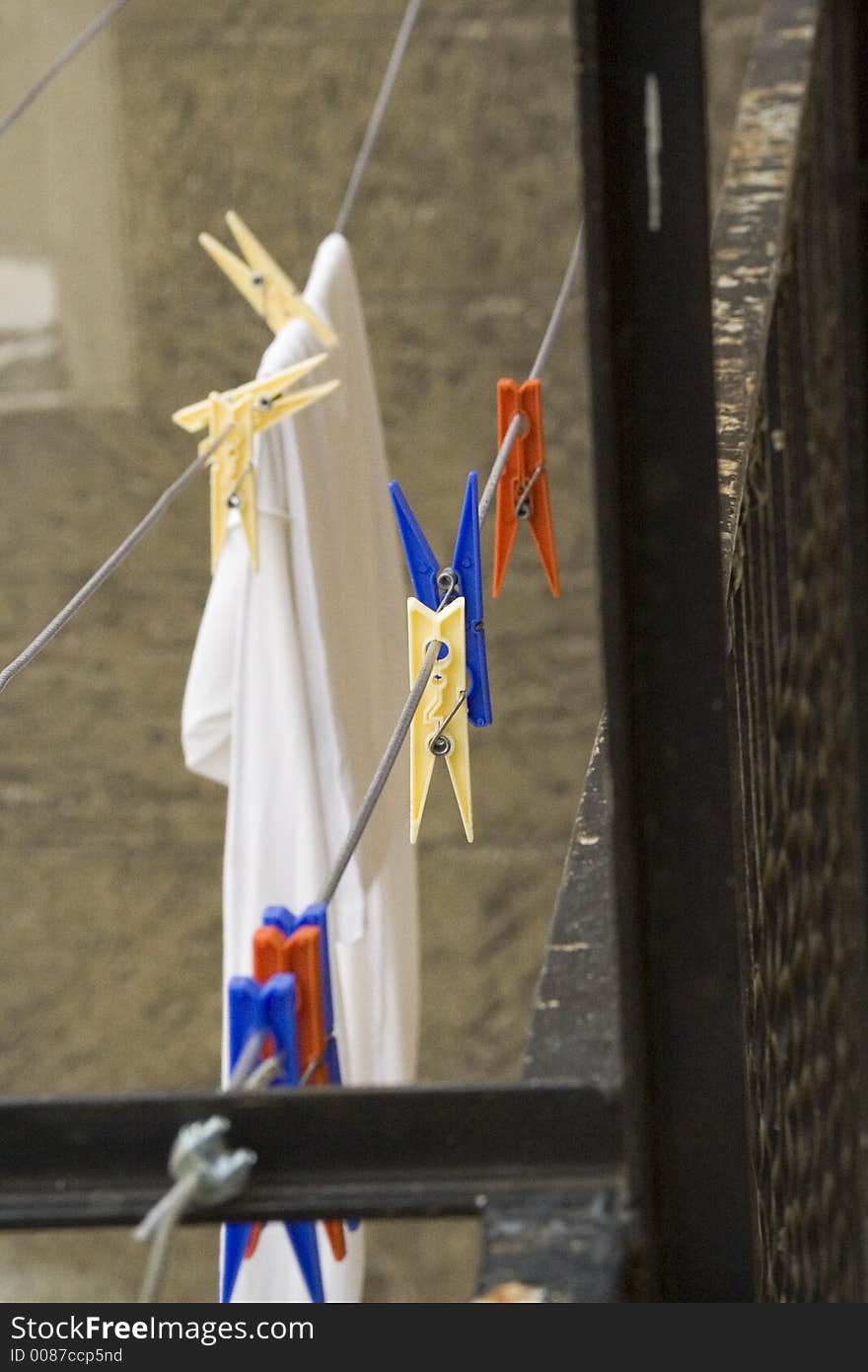 Washing hanging out to dry on a balcony in Milan, Italy. Washing hanging out to dry on a balcony in Milan, Italy