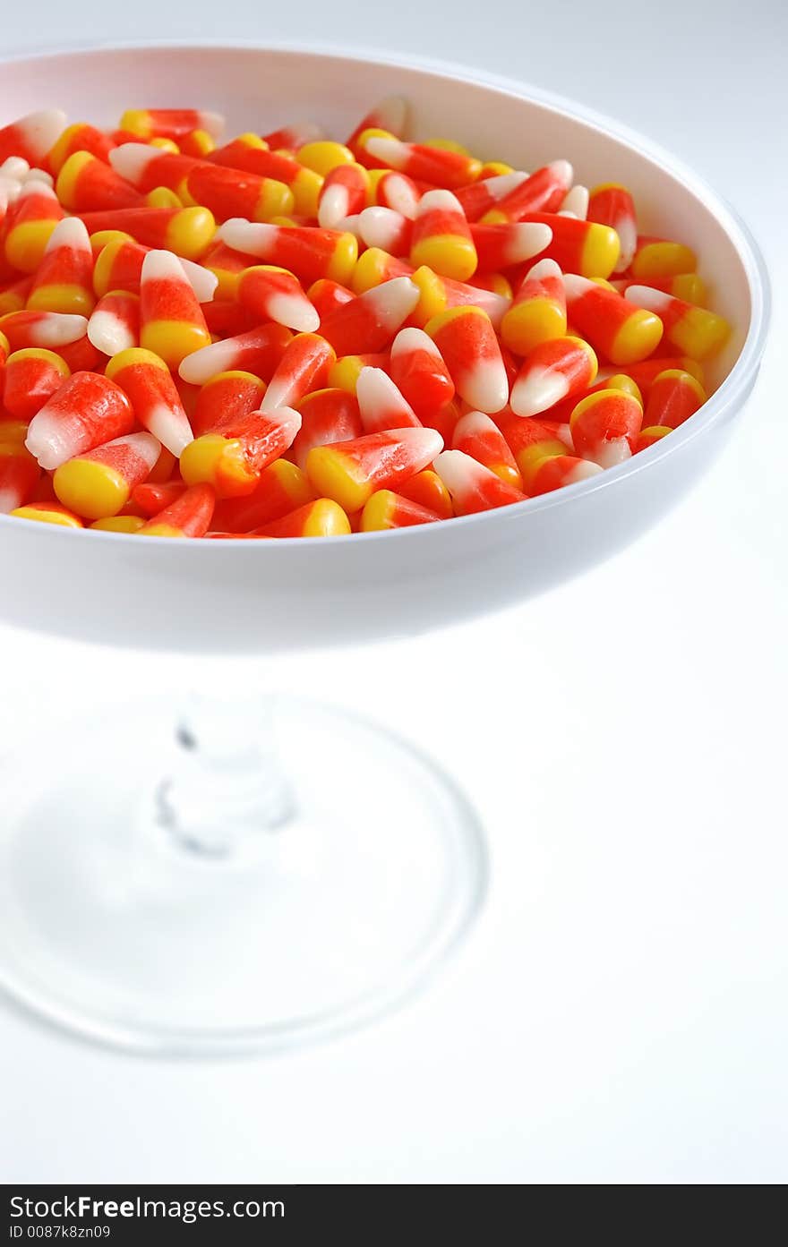 Halloween candy corn in white bowl