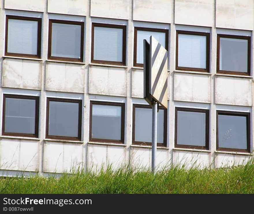 Windows on office building and sign. Windows on office building and sign